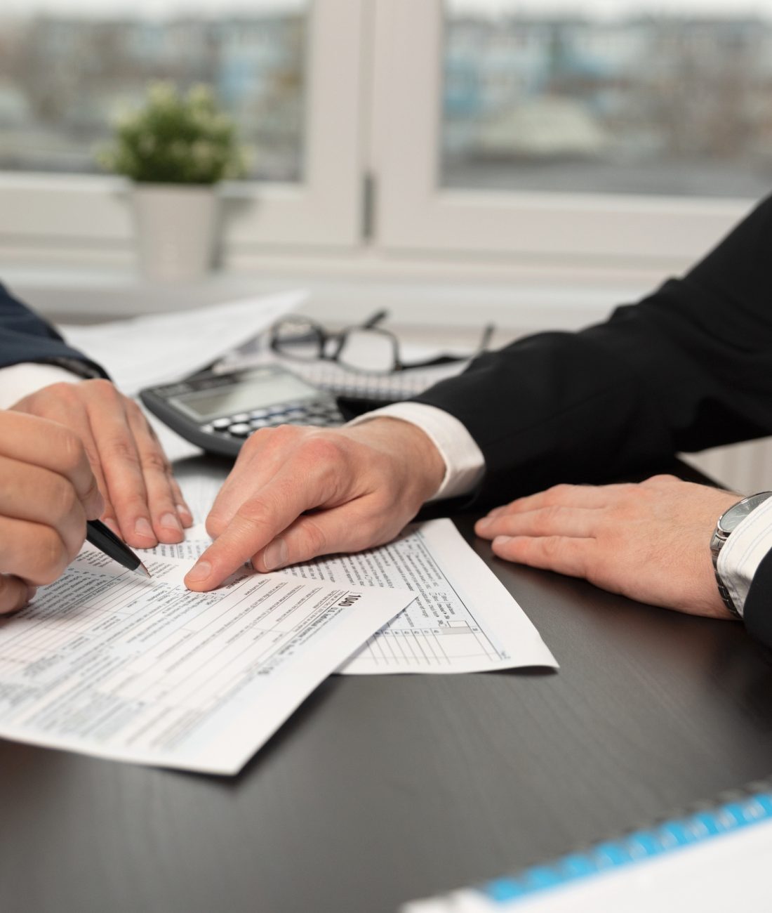 people discussing tax in vmsm consultants office